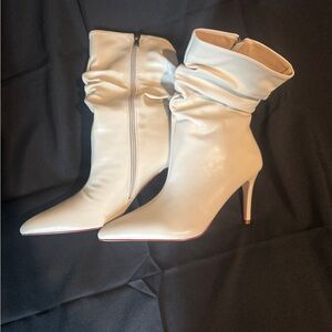Cream Heeled Boots with Stiletto Heel and Slouchy Design
